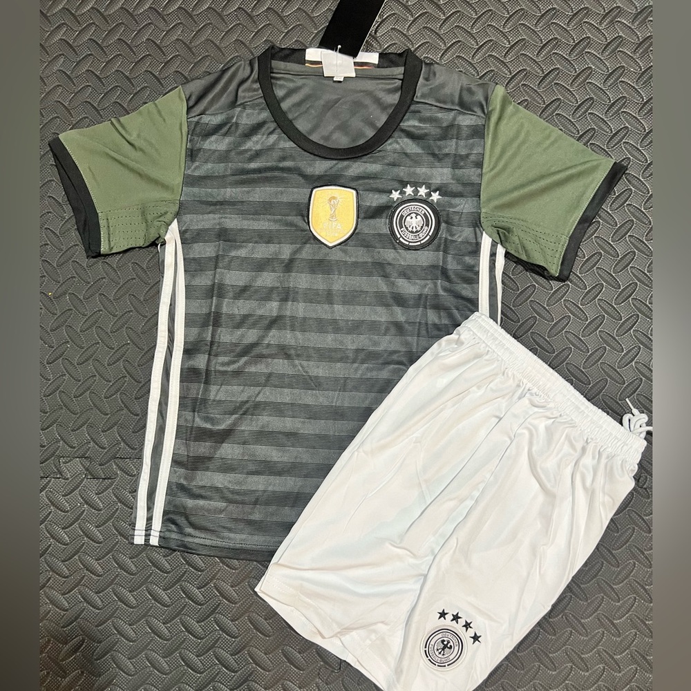 Beautiful brand new Germany kids soccer fan set (jersey + short)